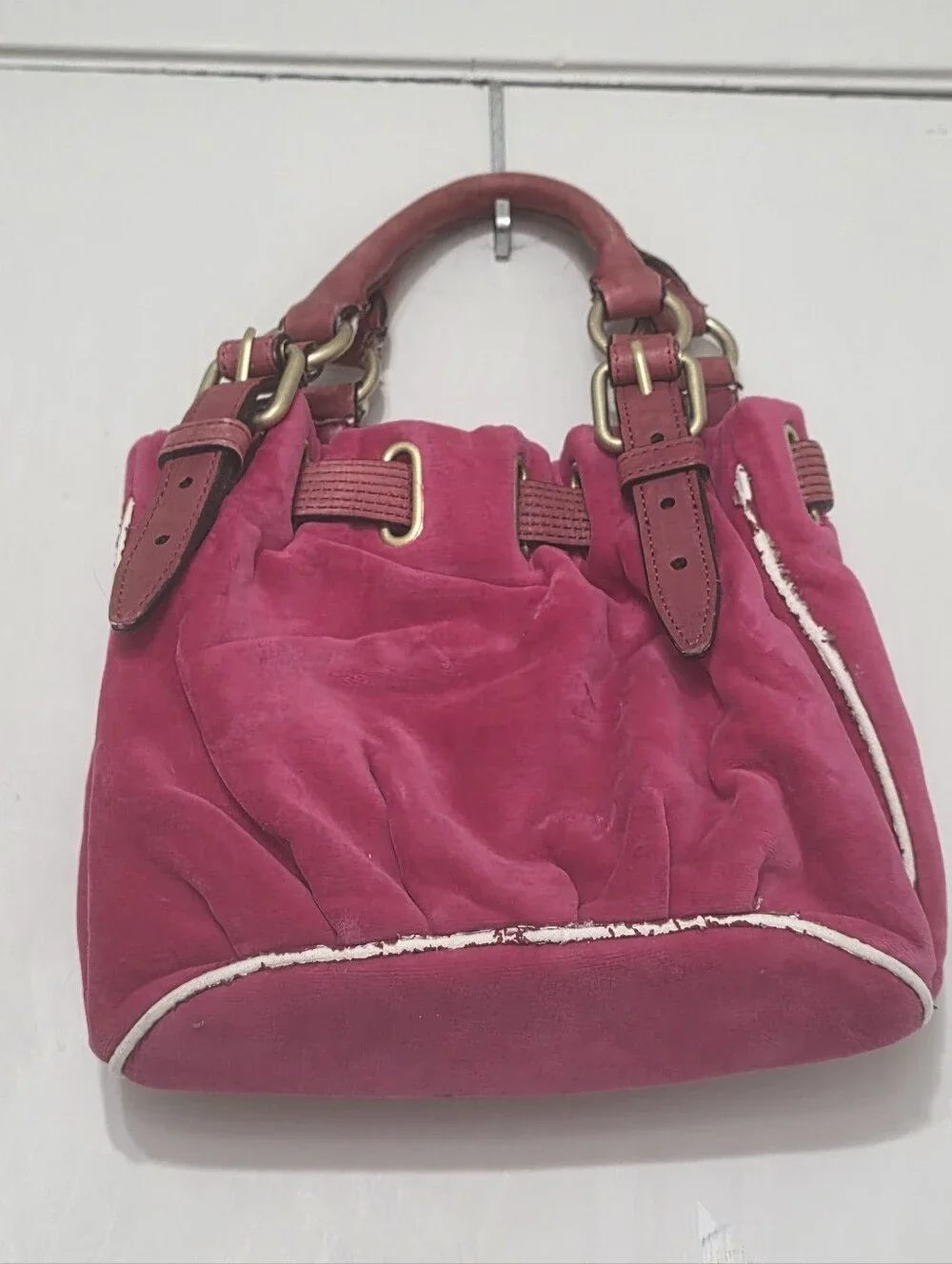 Juicy Couture removed leather